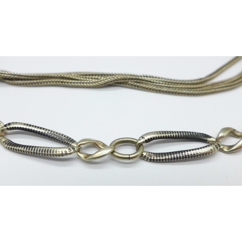 1037 - Two white metal watch chains including one niello