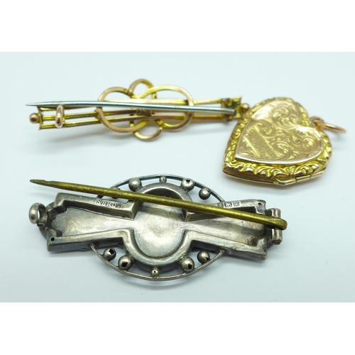 1038 - A 9ct gold brooch, 2g, a silver brooch with applied gold decoration and a 9ct gold covered locket, m... 