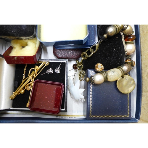 760 - Costume jewellery, a Coronation 'Litbadge', three silver thimbles, a metal core bangle, a trinket bo... 