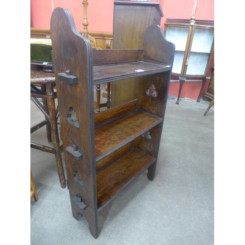 118 - An Arts and Crafts oak open bookcase