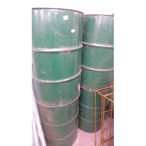 2473a - 4 green metal oil drums