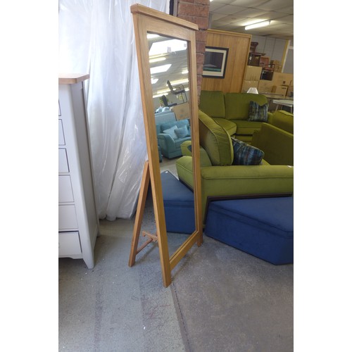 1591 - A waxed oak cheval mirror