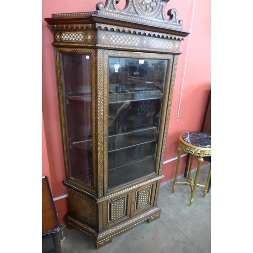 60 - A Moorish inlaid mahogany splay front side cabinet