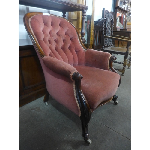 98 - A Victorian mahogany and upholstered armchair