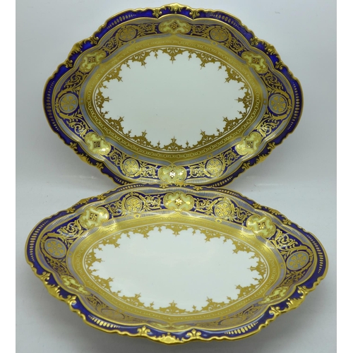 667 - A pair of Royal Crown Derby plates with gilt decoration, 4873, 26.5cm