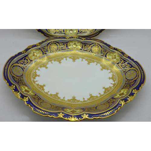 667 - A pair of Royal Crown Derby plates with gilt decoration, 4873, 26.5cm