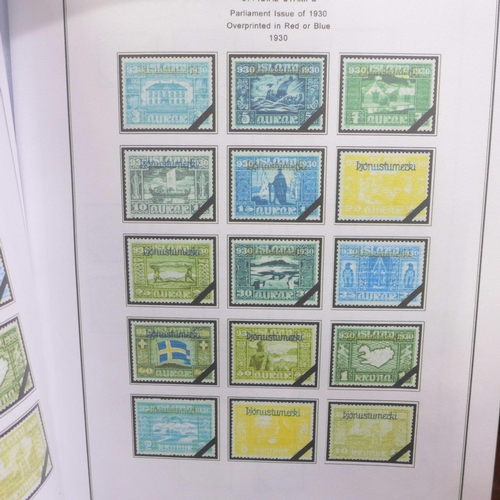 672 - An album of Iceland stamps on printed pages, together with some postal history covers, etc.