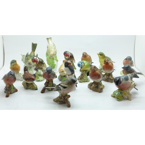 694 - A collection of bird figures including Beswick, Royal Worcester, Goebel, etc., some a/f