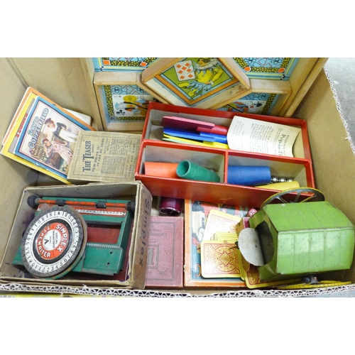 773 - A collection of toys including a tin-plate 'bathing hut', table croquet, also games including Pop-in... 