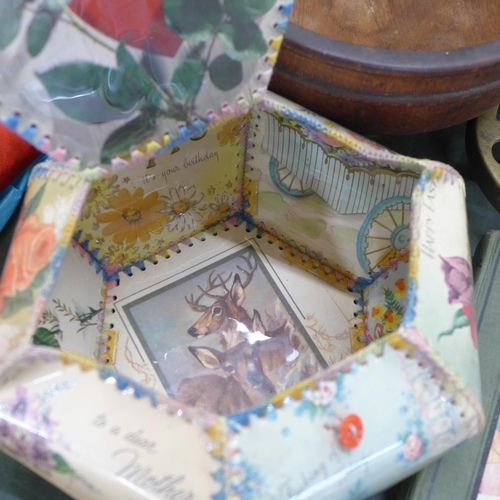 785 - A Canadian shaped box with assorted greetings, a mirror, a wooden bowl, a brass stand, and two Alice... 