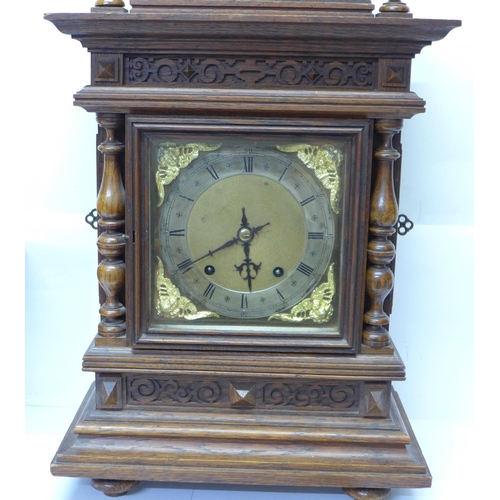 790a - A Victorian carved oak Black Forest bracket clock, marked W & H, Sch., Winterhalder & Hofmeier, Schw... 