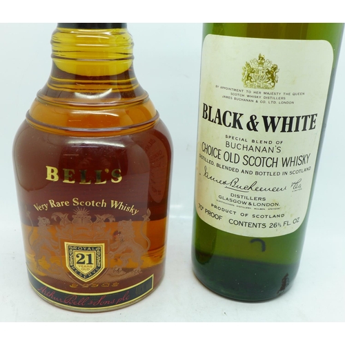 797 - Two bottles of whisky, Black & White, 26 2/3oz and Bell's Very Rare, 70cl