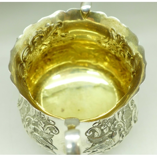 845 - A white metal sugar with gilt interior, 162g