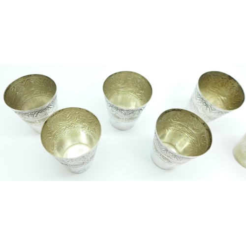 857 - A set of six small white metal cups