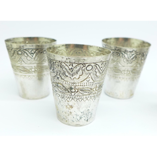 857 - A set of six small white metal cups