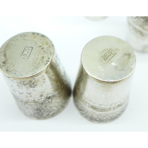 857 - A set of six small white metal cups