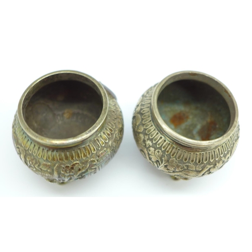 858 - A pair of Eastern white metal salts