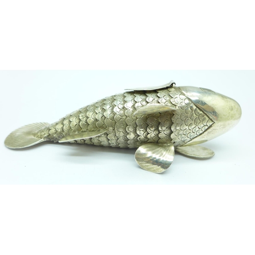 859 - A novelty articulated model of a fish, marked T90, 14cm