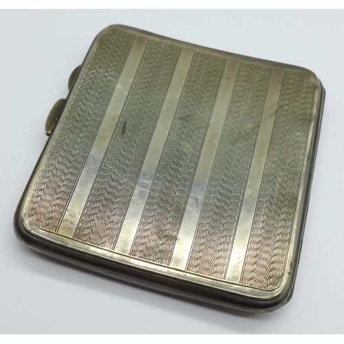 864 - A silver cigarette case, 100g