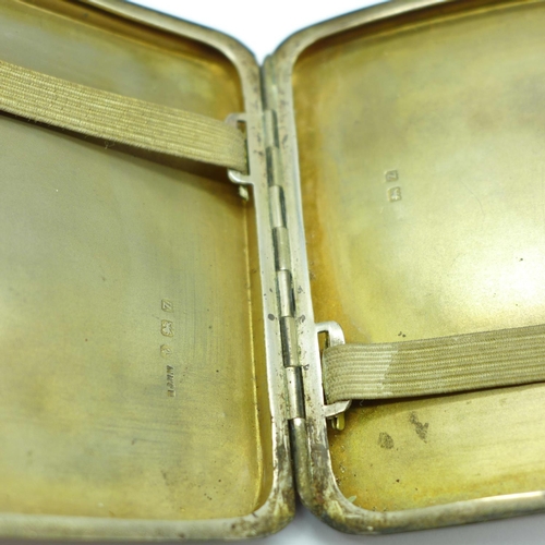 864 - A silver cigarette case, 100g