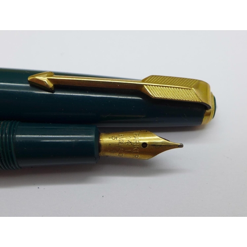 880 - A Conway Stewart No 58 pen with 14ct gold nib and matching pencil, a Parker Slimfold with 14ct gold ... 