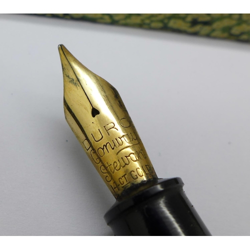 880 - A Conway Stewart No 58 pen with 14ct gold nib and matching pencil, a Parker Slimfold with 14ct gold ... 