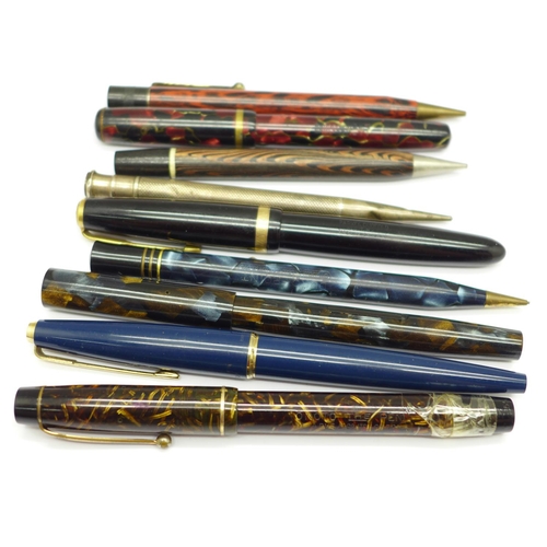 906 - Three pens with 14ct gold nibs, one a/f, two other pens, a silver pencil and three other pencils