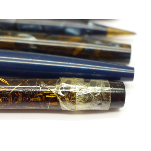 906 - Three pens with 14ct gold nibs, one a/f, two other pens, a silver pencil and three other pencils