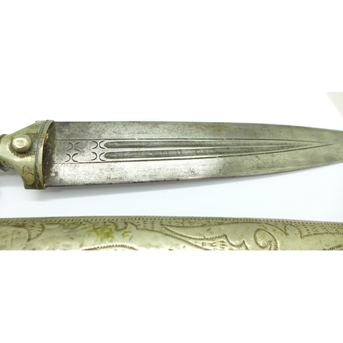 915 - An Eastern dagger with scabbard, blade 23cm