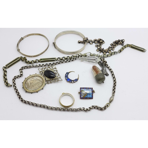 918 - Jewellery including a Victorian silver Malmesbury Abbey brooch, lacking hook, an enamel Capri brooch... 