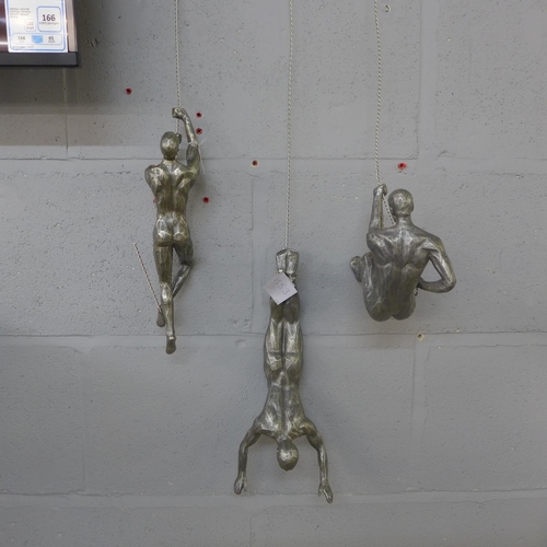 1558 - A set of three silver abseiling men wall figures (CRT1024)   #