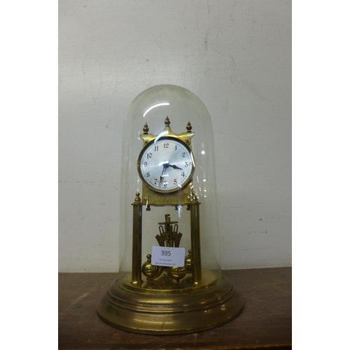 395 - A German brass anniversary clock