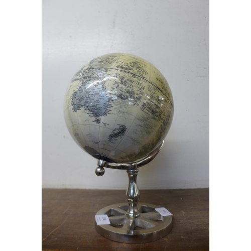 398 - A small terrestrial globe on stand