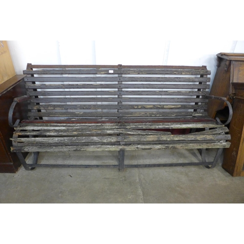 403 - A Victorian wrought iron garden bench