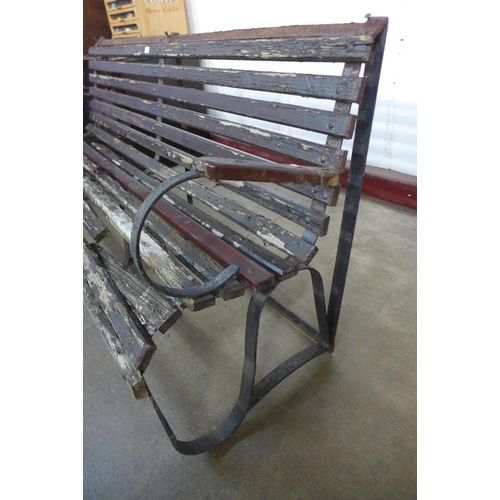 403 - A Victorian wrought iron garden bench