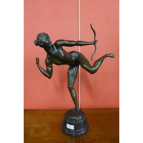 81 - A French style bronze figure of Diana the Huntress, on black marble socle