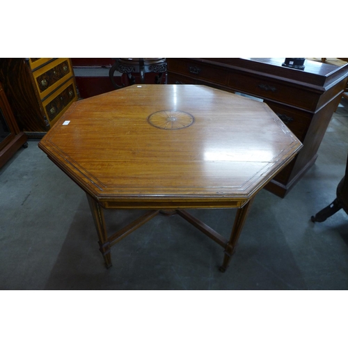 83 - A Victorian Sheraton Revival inlaid satinwood octagonal centre table