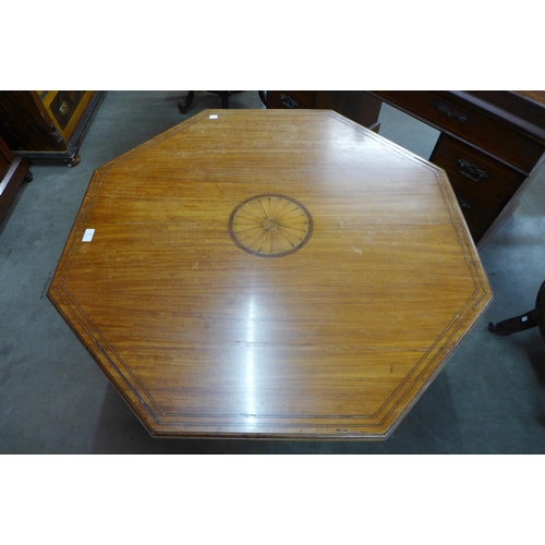 83 - A Victorian Sheraton Revival inlaid satinwood octagonal centre table