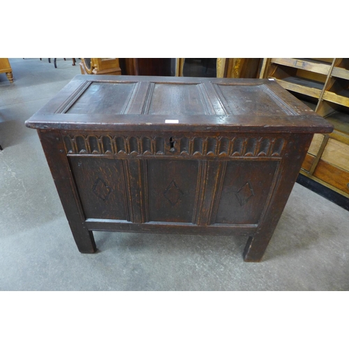 85 - A William III carved oak coffer