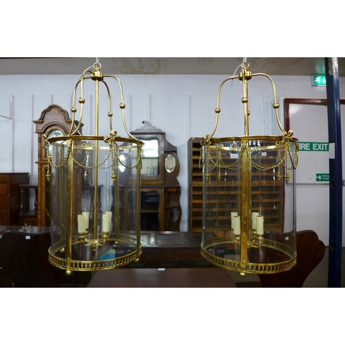 94 - A pair of French style gilt metal cylindrical hanging ceiling lanterns