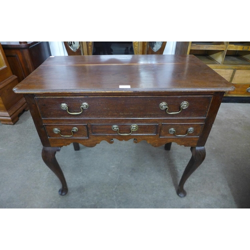 95 - A George III mahogany lowboy