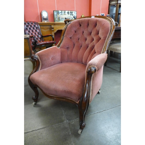 98 - A Victorian mahogany and upholstered armchair