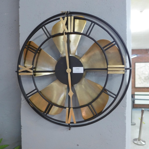 1342 - A brass and black metal fan design wall clock (75-20542)   #