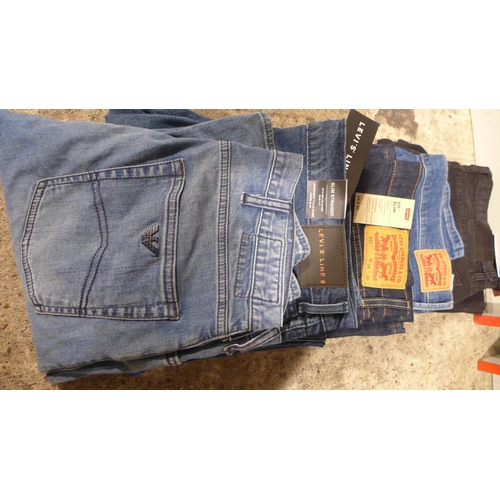 3030 - Five mixed sized branded jeans (inc. Levis, Armani) * This lot is subject to VAT