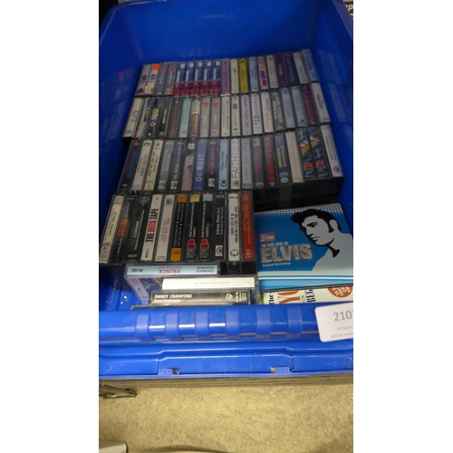 2101 - Tub of at least 50 music cassettes plus a few newspaper CD's