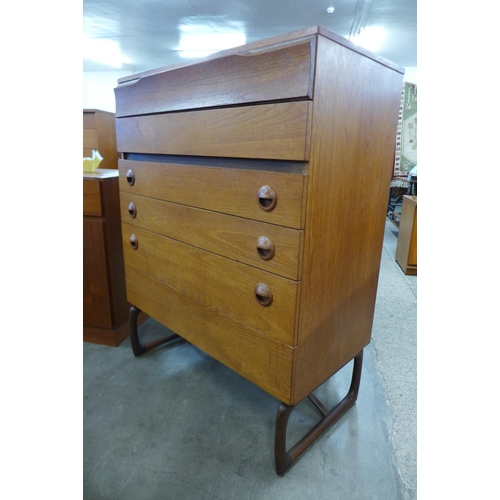 140 - A teak chest of drawers