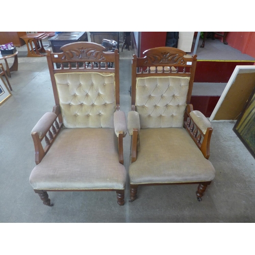 224 - A pair of Victorian carved walnut and upholstered armchairs