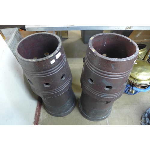 372 - A pair of glazed terracotta chimney pots