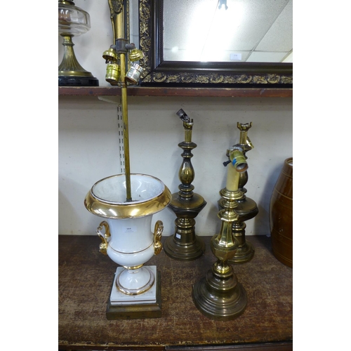 411 - Three brass table lamp bases and one other