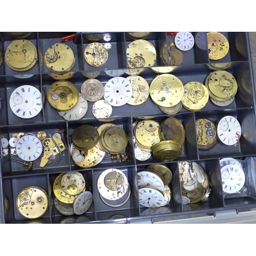 679 - A collection of pocket watch dials and movements